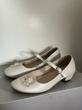 Girls ivory low heeled